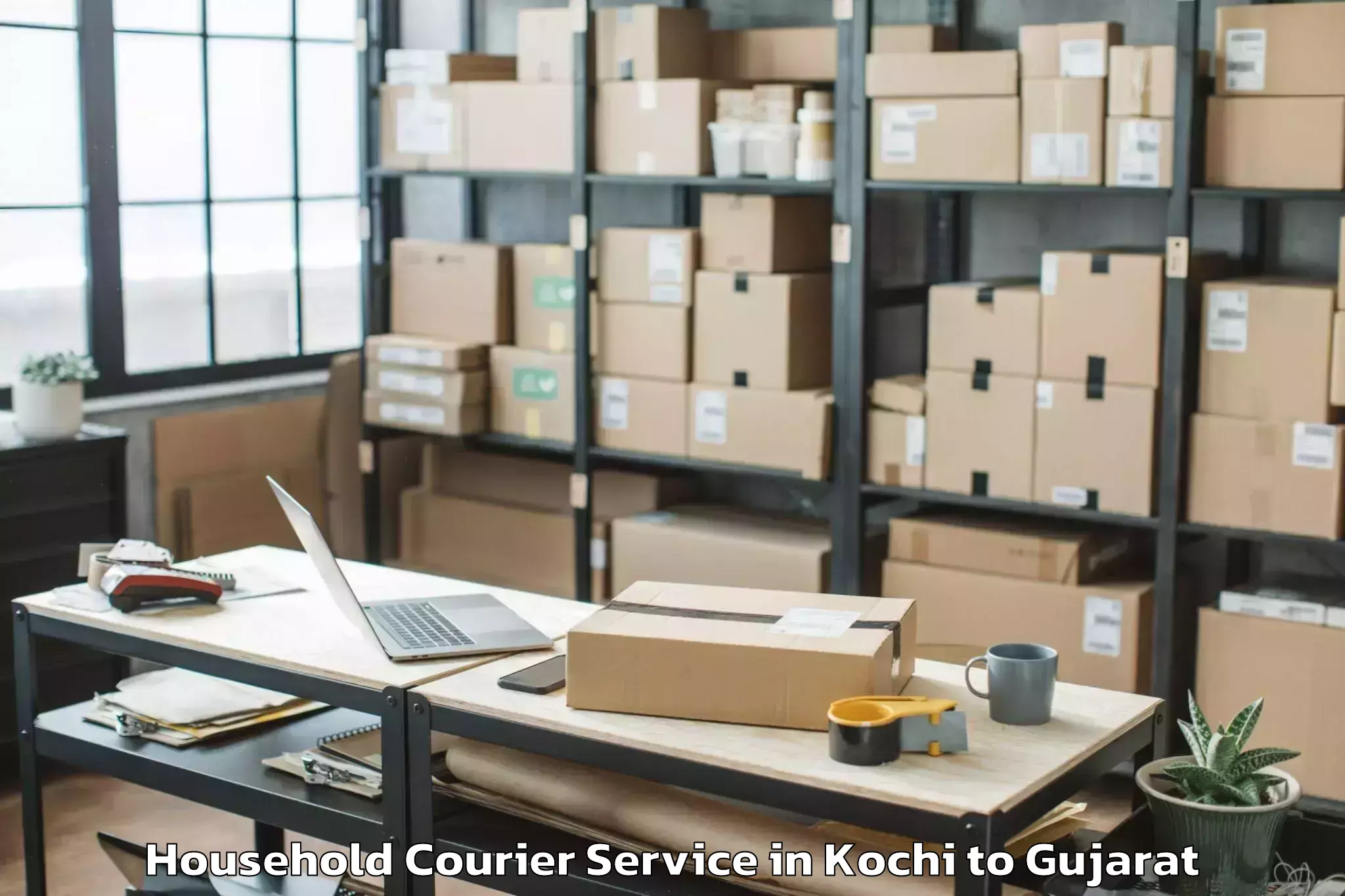 Easy Kochi to Ahmedabad Airport Amd Household Courier Booking